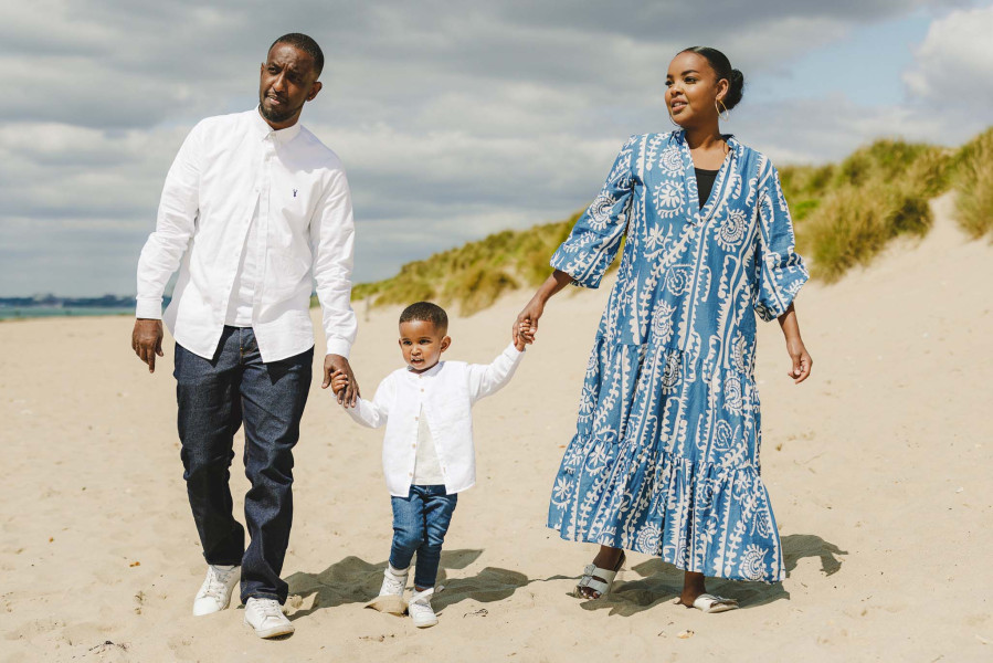 Relaxed family portrait on the beach in Bournemouth