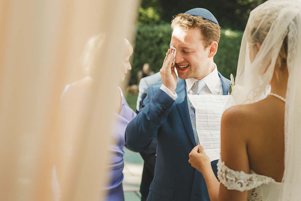 Emotional groom wedding documentary photography