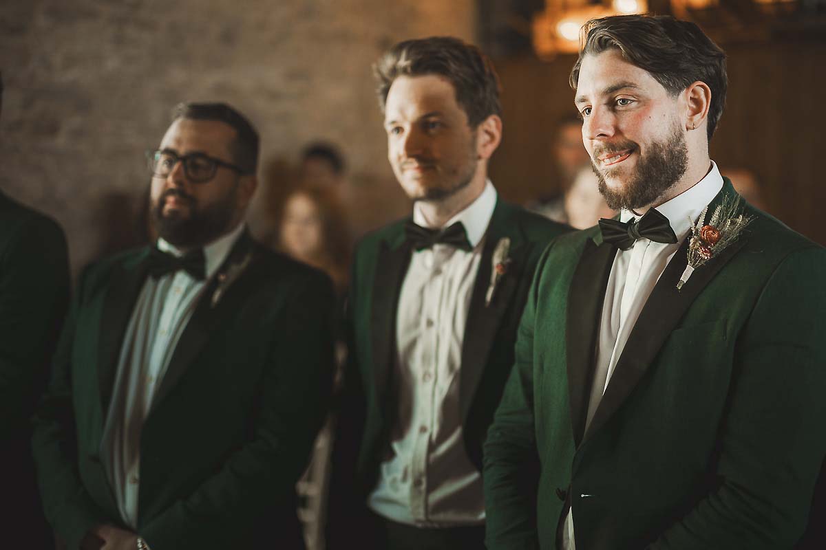 Groom reacts seeing bride - by Dorset documentary wedding photographer Paul Underhill