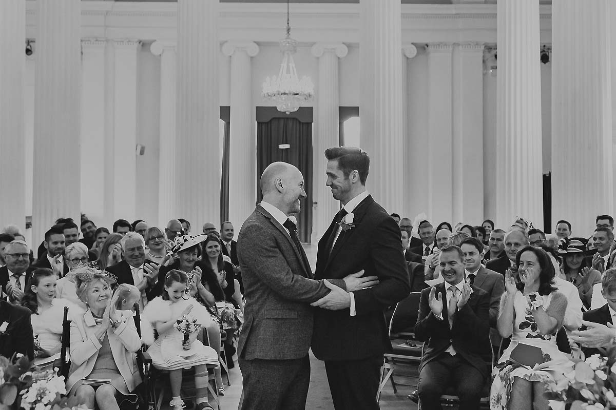 Grooms marry London gay wedding photography