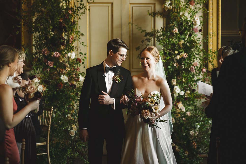 Wedding ceremony with couple and guests at St Giles House in Dorset