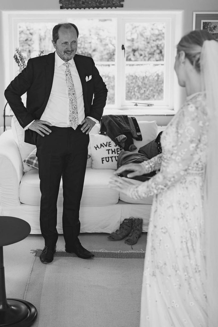 Faye’s dad looking proudly at her before the wedding ceremony