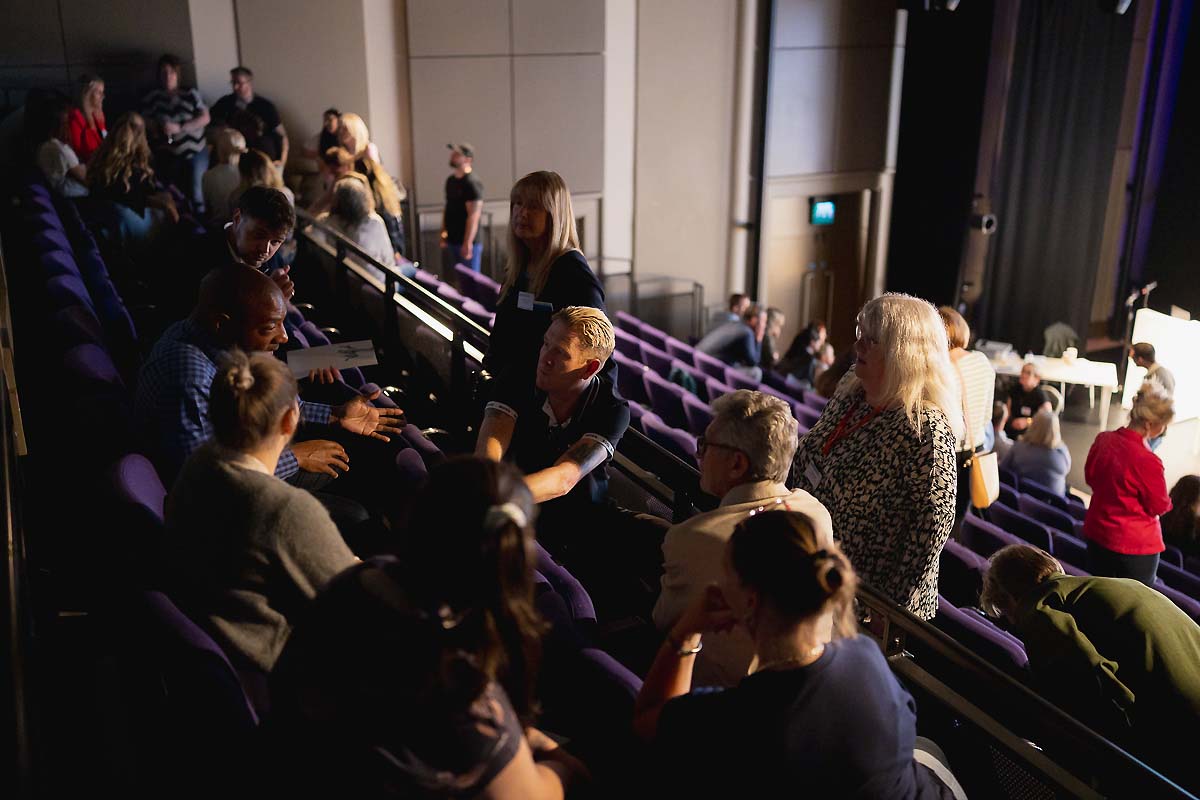 Natural, unscripted photography of event proceedings