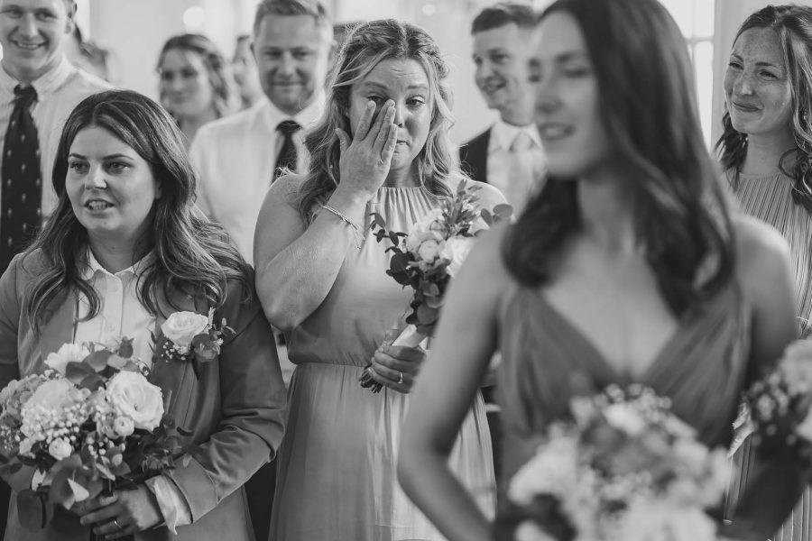 Emotional moment captured during register office wedding in Poole