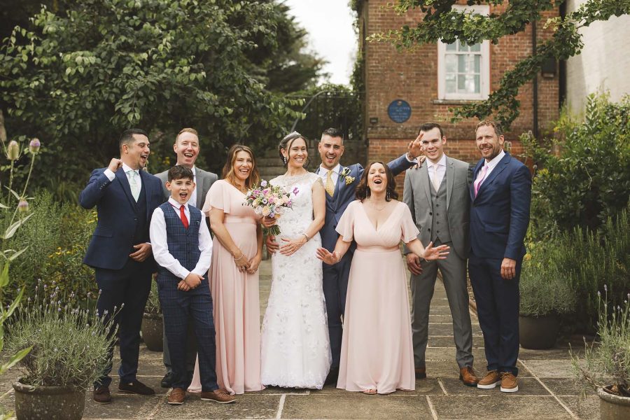 Relaxed wedding portrait in the gardens of Wimborne Town Hall register office