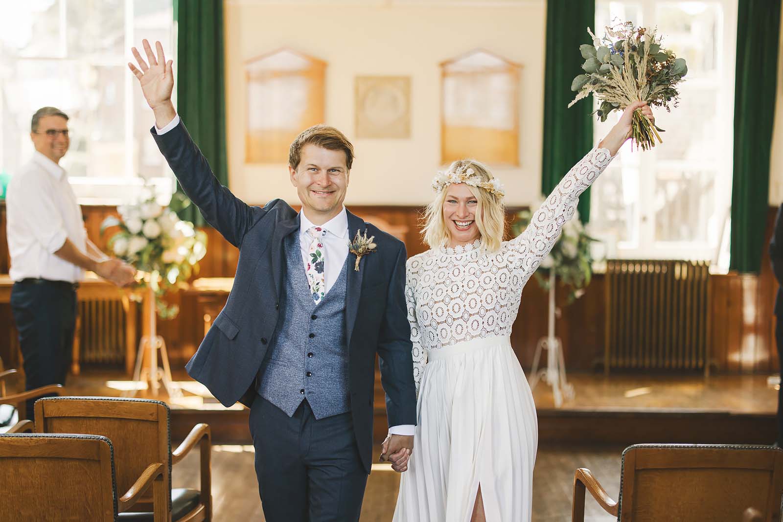 Bride and groom celebrating in Bournemouth Register Office after their civil ceremony