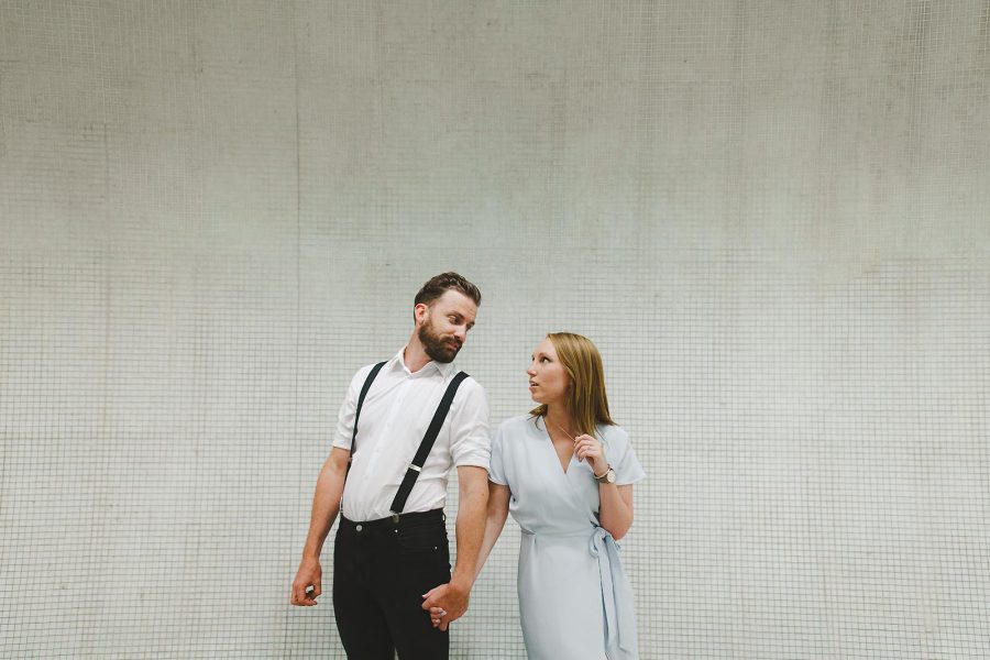 Couple holding hands during an editorial style pre-wedding shoot