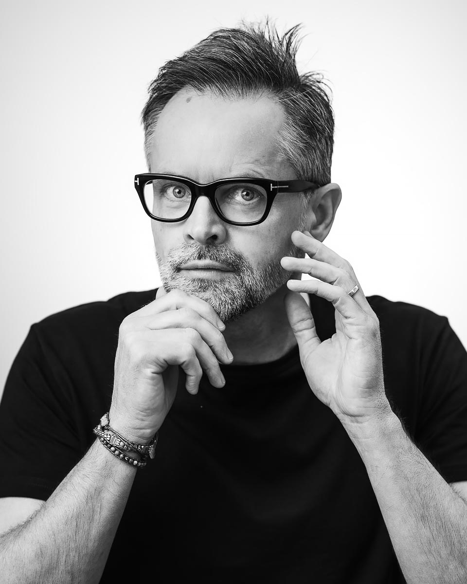 Creative black and white headshot for a freelancer taken on location in Bournemouth, Dorset