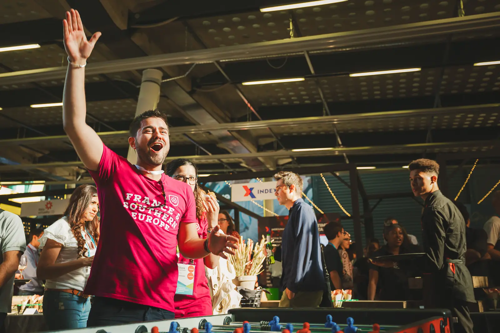 Conference delegate reacting excitedly during a lively moment at an Dorset corporate event