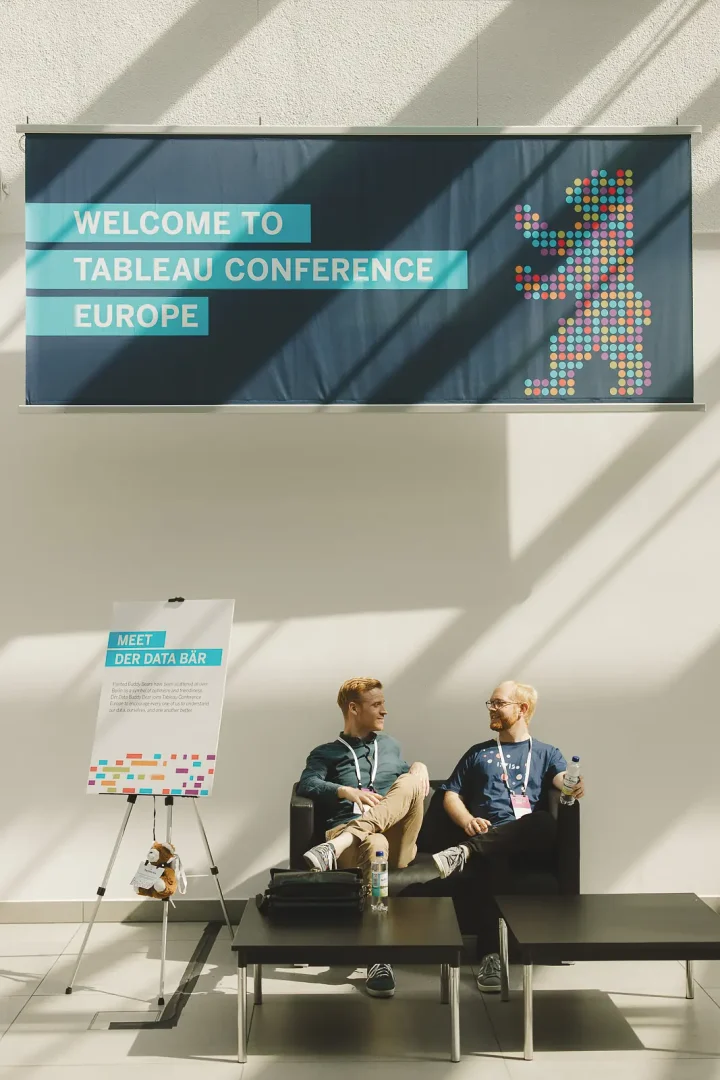 Branded conference environment with delegates relaxing between talks at the event venue