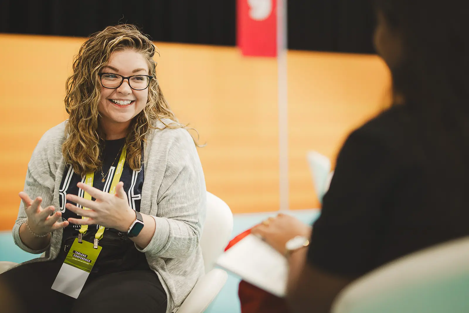 Conference delegate being interviewed during a business event