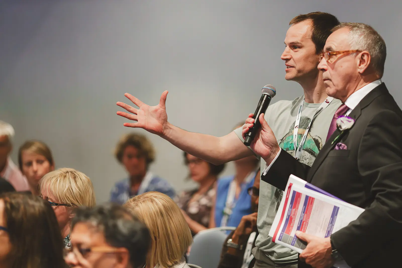 Conference delegate asking a question during a talk at Bournemouth International Centre