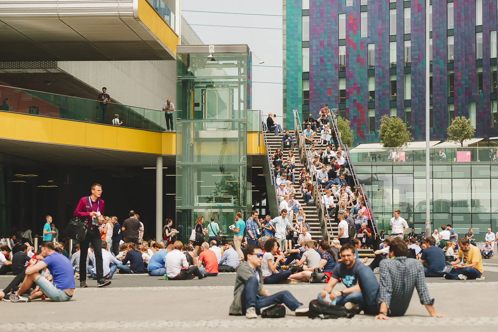 Conference delegates gathering outside ExCeL London during a break in the conference programme