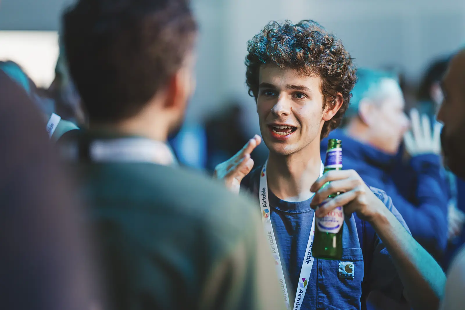 Conference delegates in conversation during a networking event in London