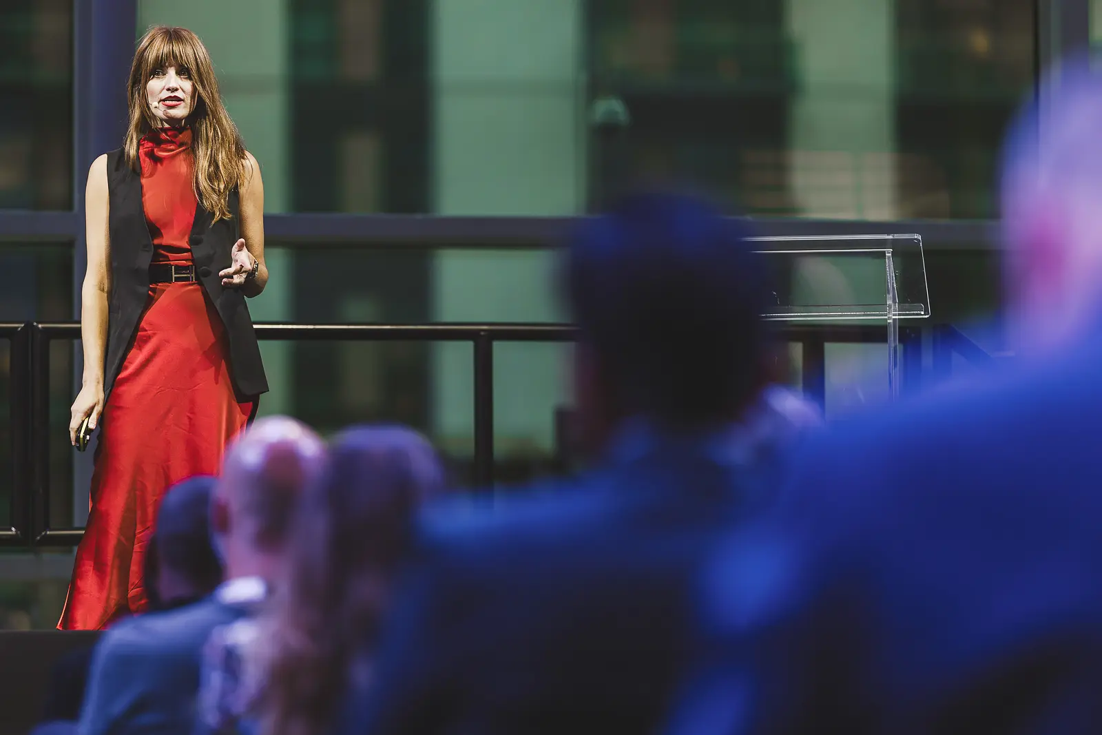Conference speaker presenting to delegates during a business event in London