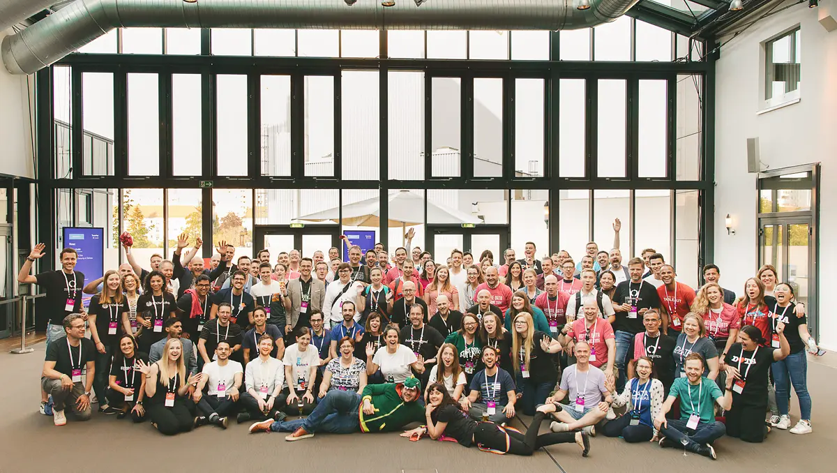 Group photo of attendees at a corporate business event