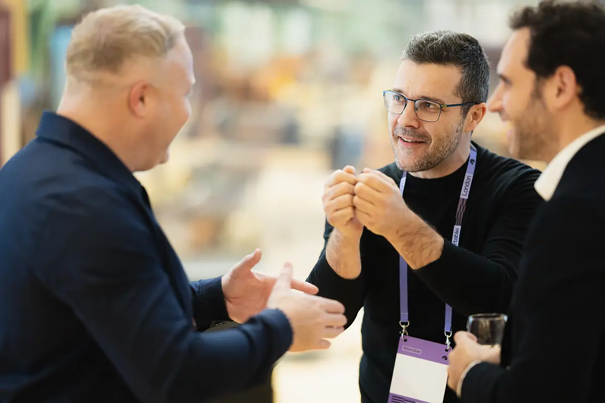 Business professionals networking and talking during a corporate event