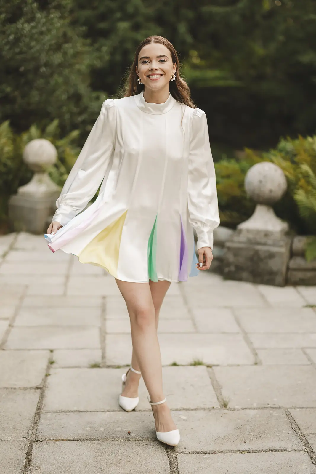 Bride wearing Oliver Rubin Dora reception dress at Larmer Tree Gardens wedding