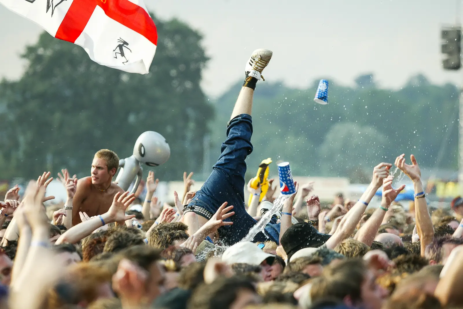 Crowd surfer above the audience at Reading Festival, 2002