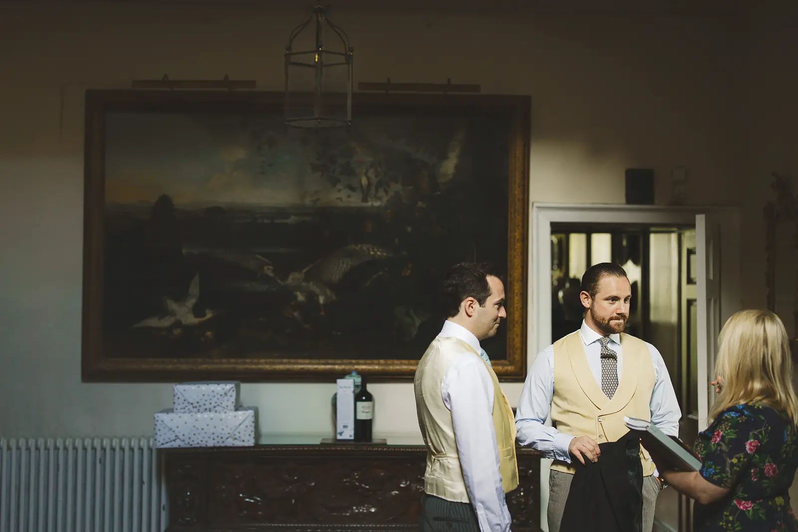 Groomsmen preparing inside Smedmore House before the wedding ceremony in Dorset