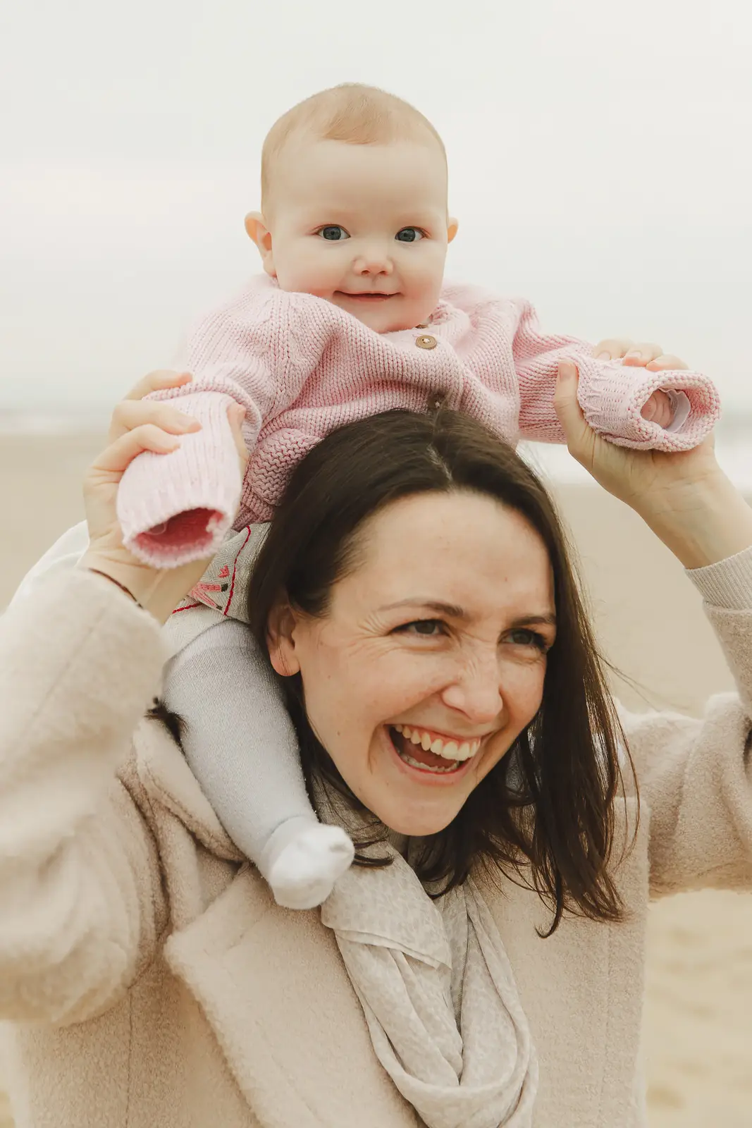 Mother and baby photographed during a relaxed family shoot on Sandbanks Beach in Poole.