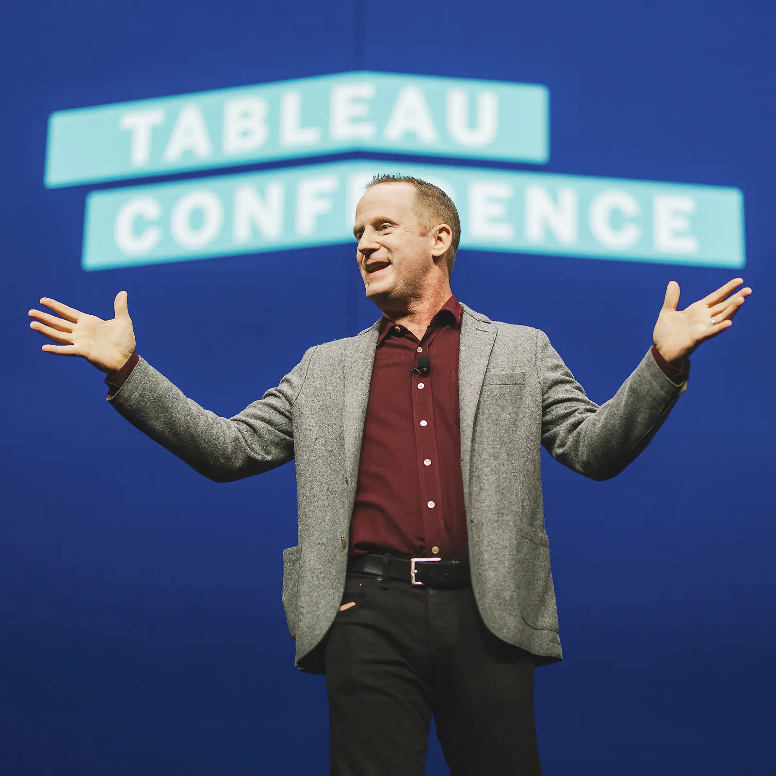 Keynote speaker presenting on stage at Tableau Conference in Las Vegas, photographed during a large-scale technology event
