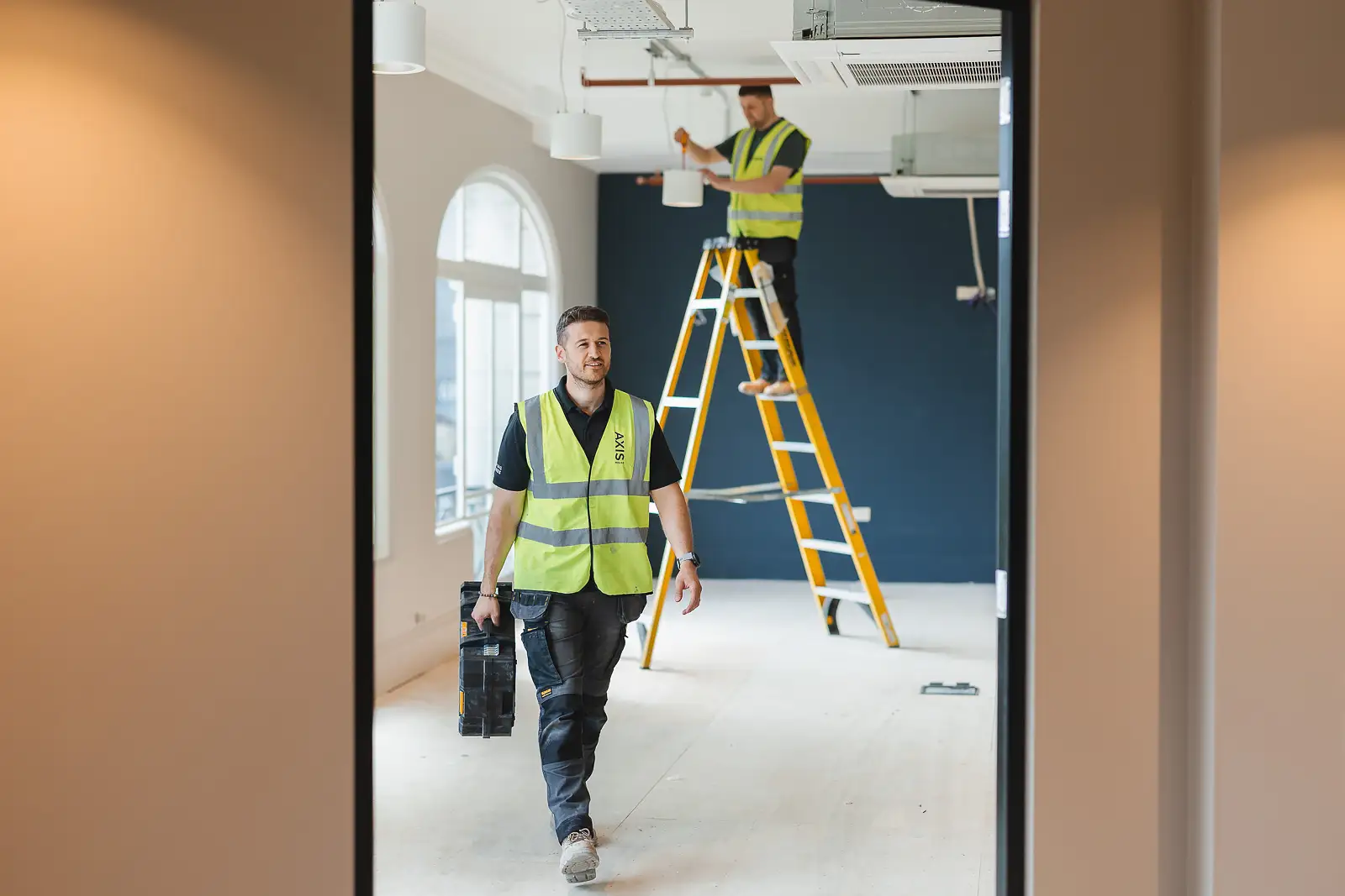 Trades team working on site during a branding photography shoot for a Dorset business.