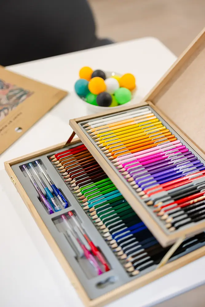 Creative materials and coloured pencils photographed as part of a Dorset branding photography shoot.