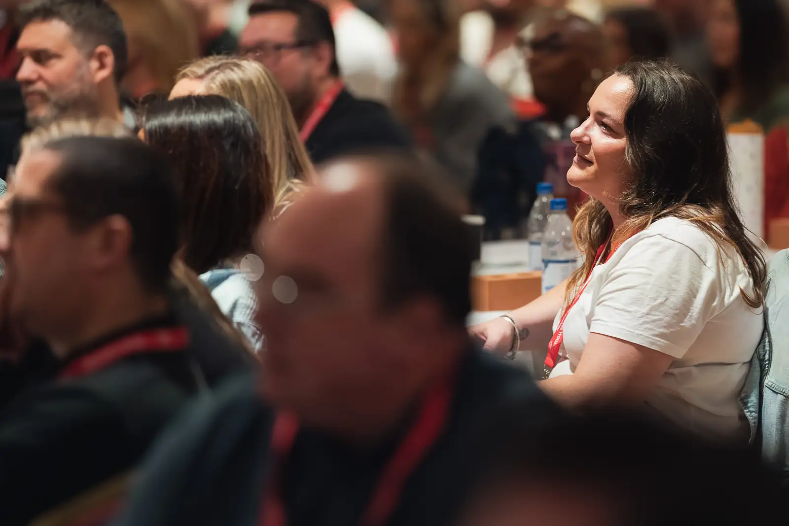Delegate reacting attentively while watching a keynote presentation at a corporate away day event in Somerset