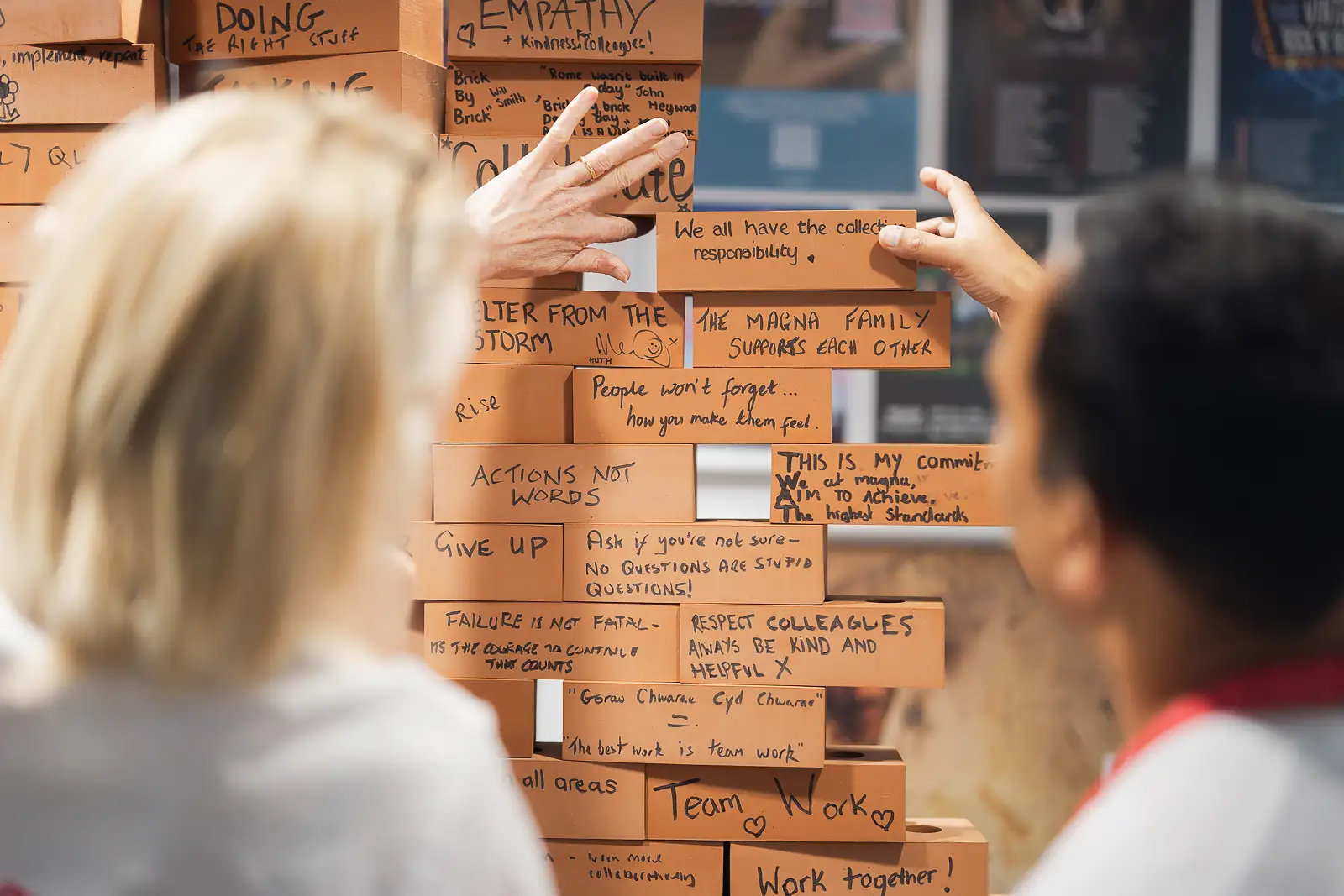 Team workshop activity at Westlands Theatre, showing colleagues building a values wall during a corporate away day.
