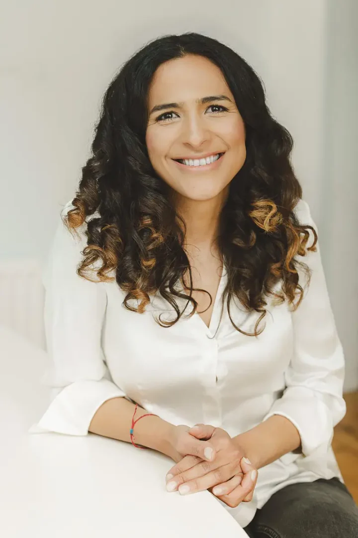 Personal branding portrait of an independent professional photographed in a relaxed home-style setting in Bournemouth.