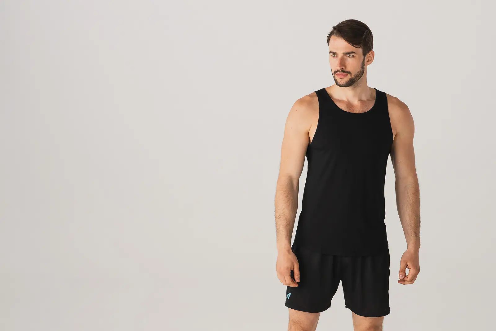 Studio portrait of a man in black activewear, shot for a Bournemouth advertising photography campaign